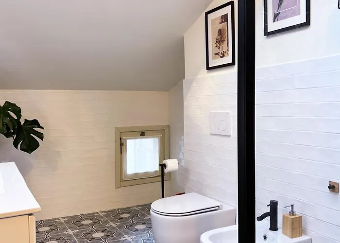 Apartamento Maison Mezzanotte Mansarda Chic In Centro Con Parcheggio Privato